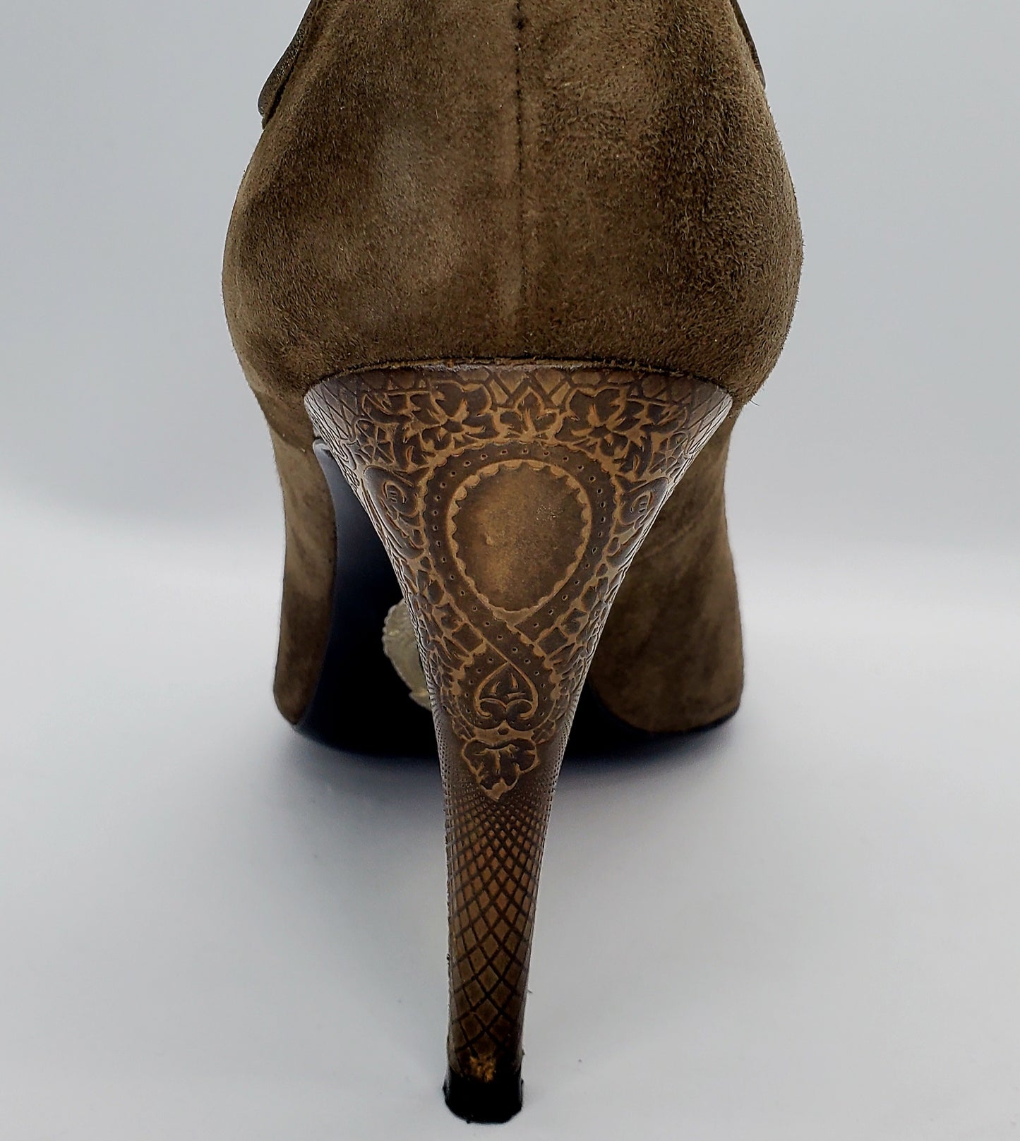 Close up view of patterned leather Elie Tahari Suede open toe pump