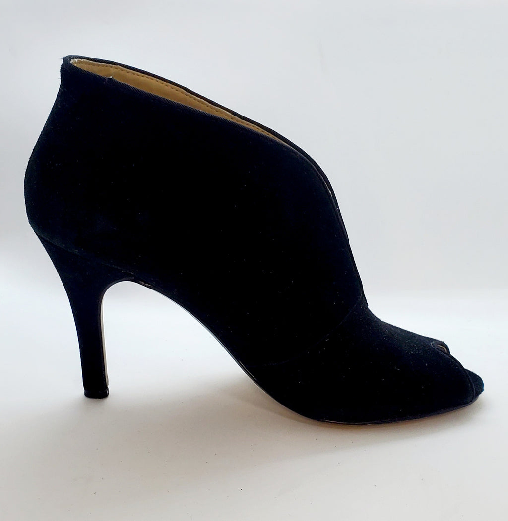 Side view of Adrienne Vittadini black Open toe, high top high heel shoes