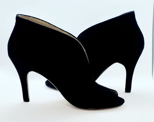 side views of Adrienne Vittadini black Open toe, high top high heel shoes