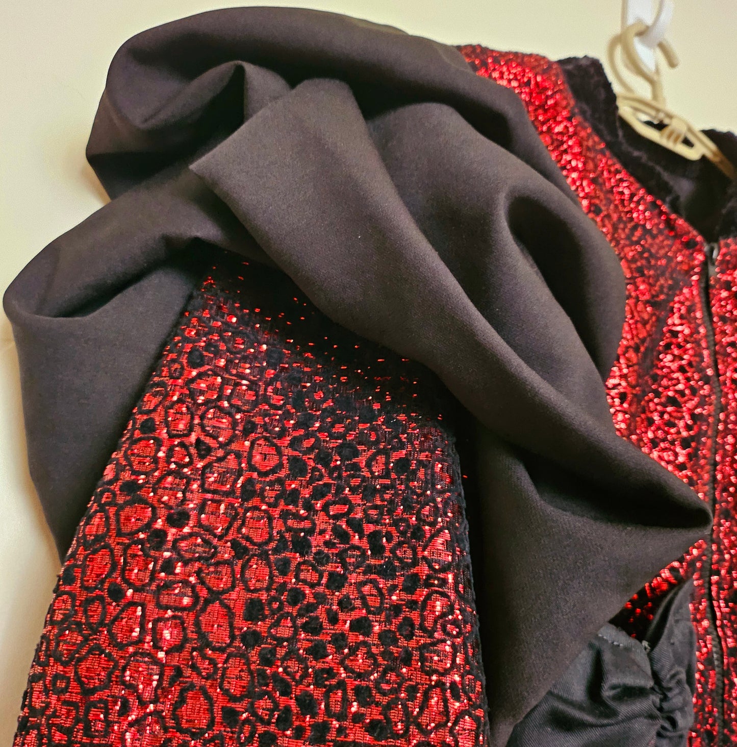 ROUGE- Flocked shimmer bomber with exaggerated sleeves and matching one-of-a-kind pockets