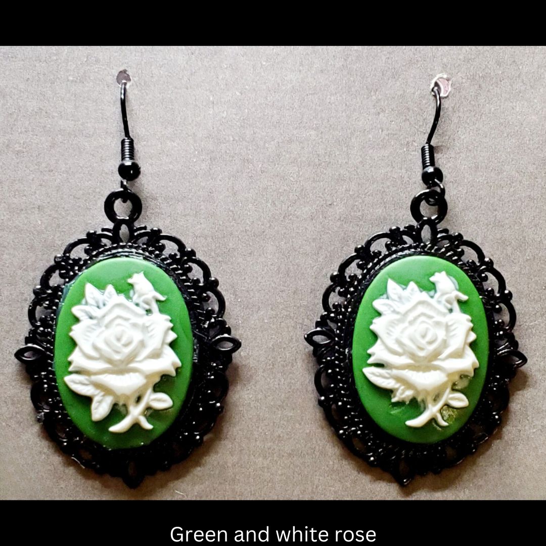 Goth-inspired green and white acrylic 3D rose and black filigree earrings