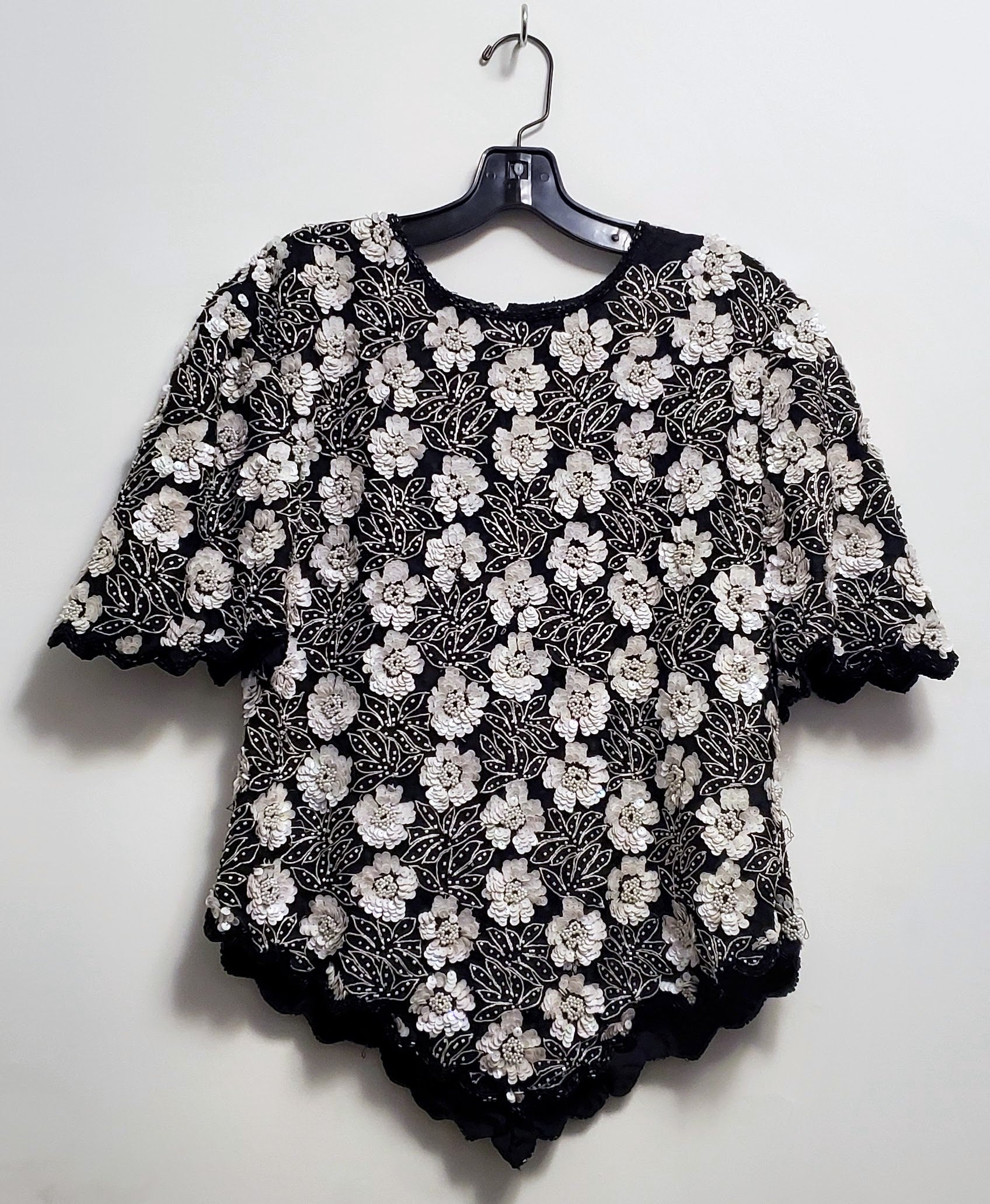 Front view of Vintage 80s Black and White Beaded Floral Top