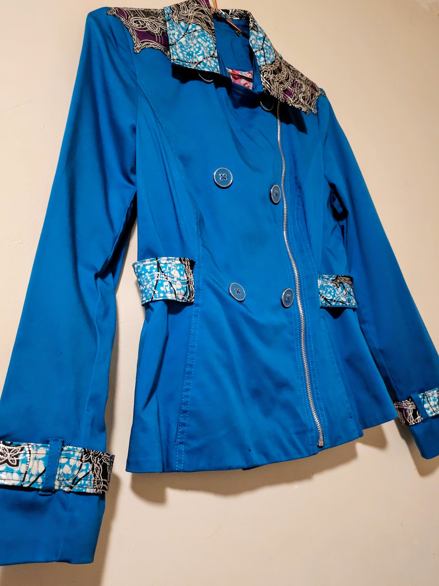 SEMAI-Teal raincoat with Ankara fabric accents