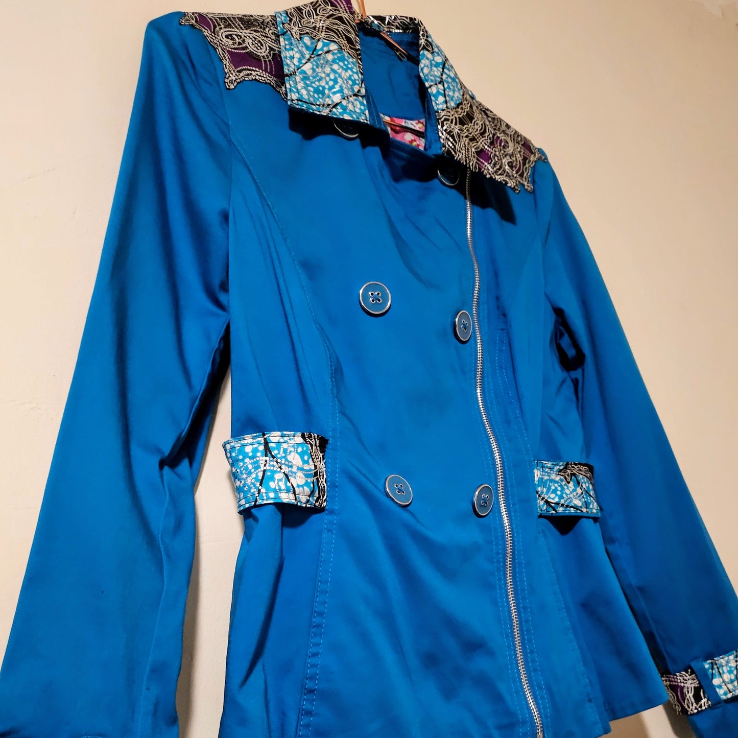 SEMAI-Teal raincoat with Ankara fabric accents