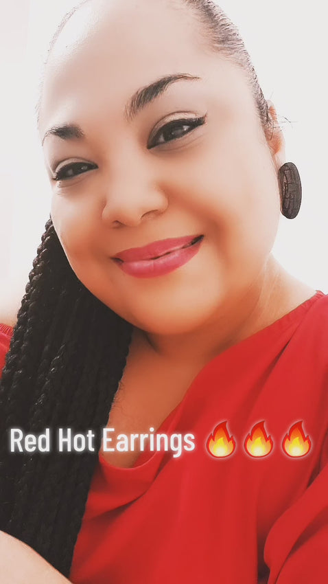 Video of model wearing earrings