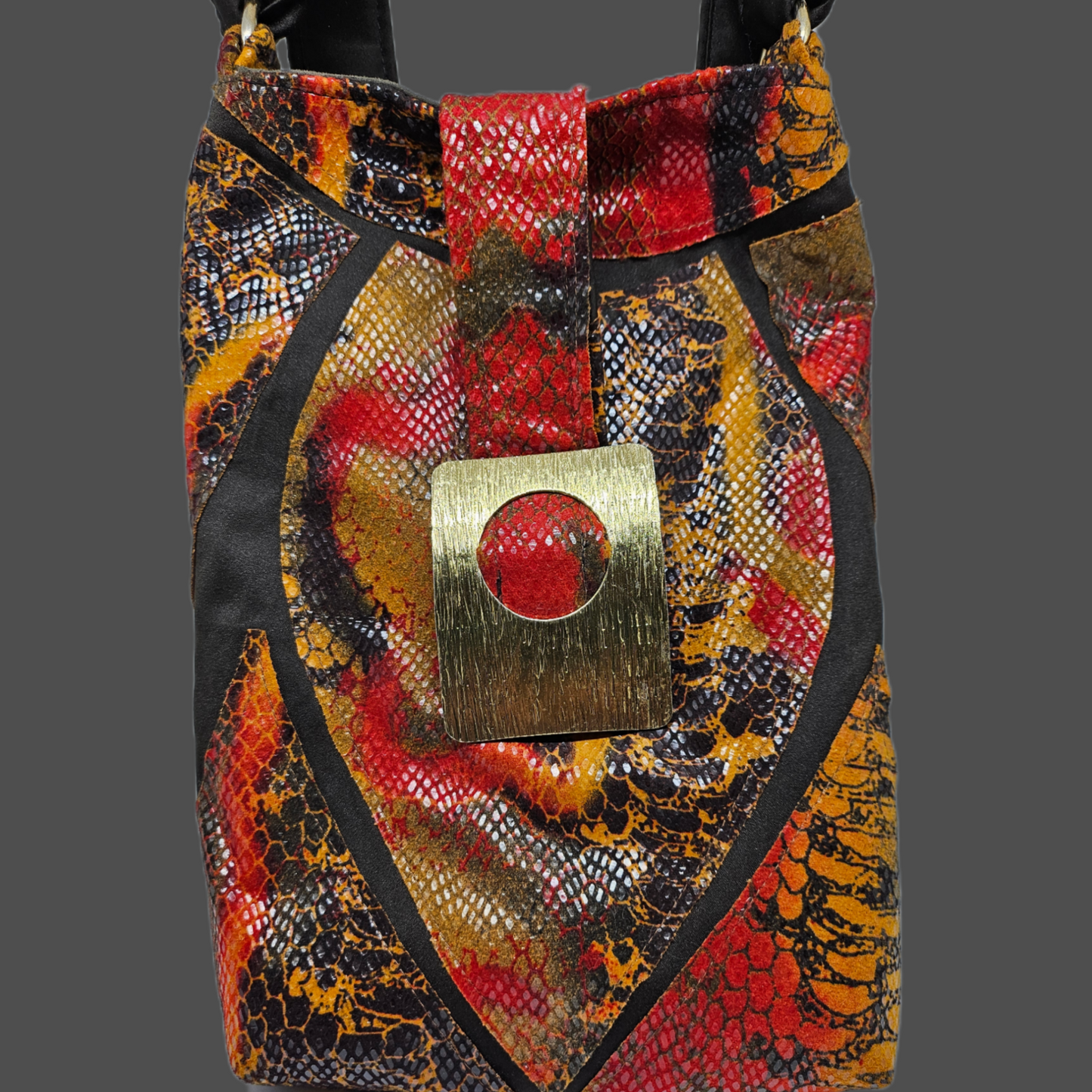 Close up view of purse of the Burnt orange animal print hat and purse set