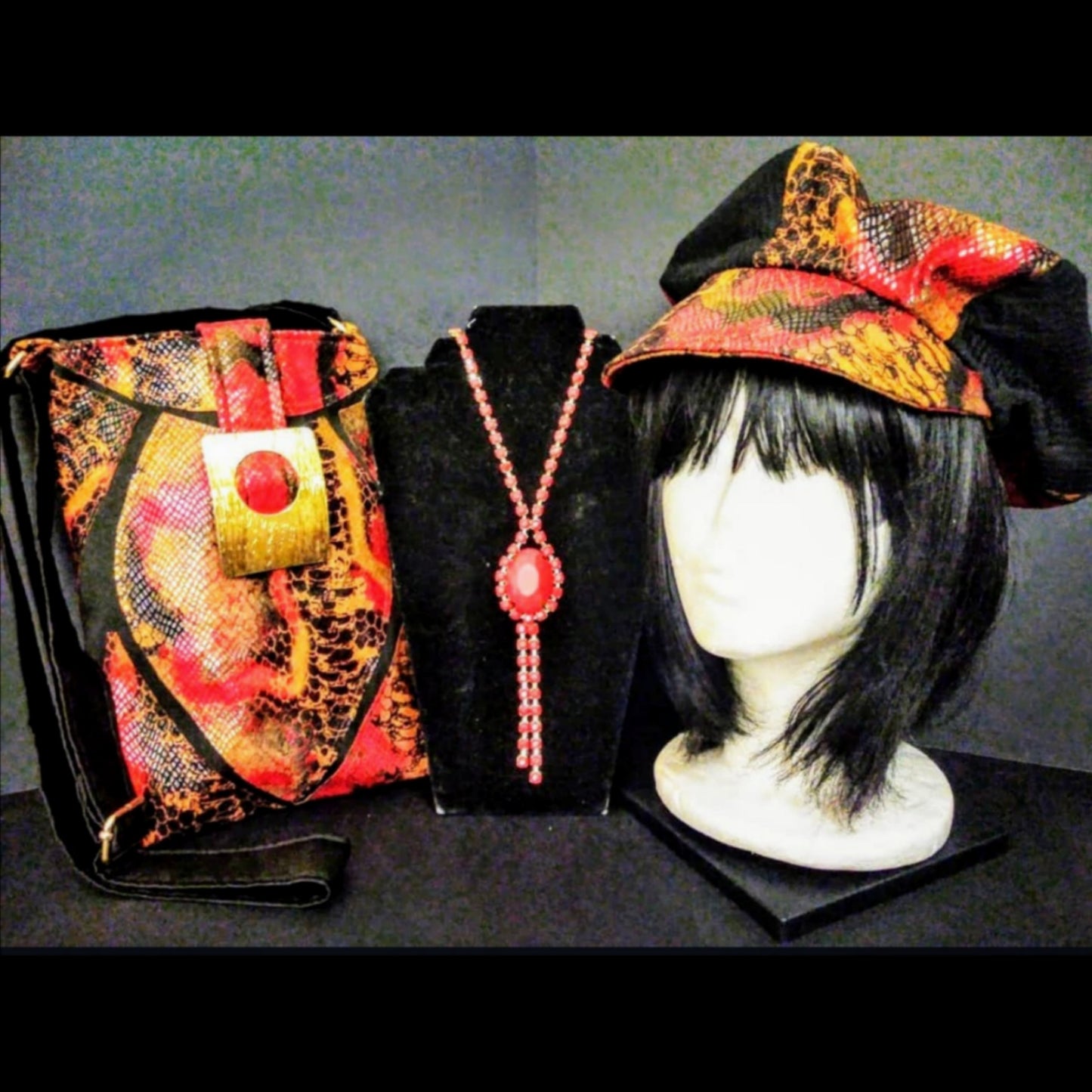 Burnt orange animal print hat and purse set on mannequin