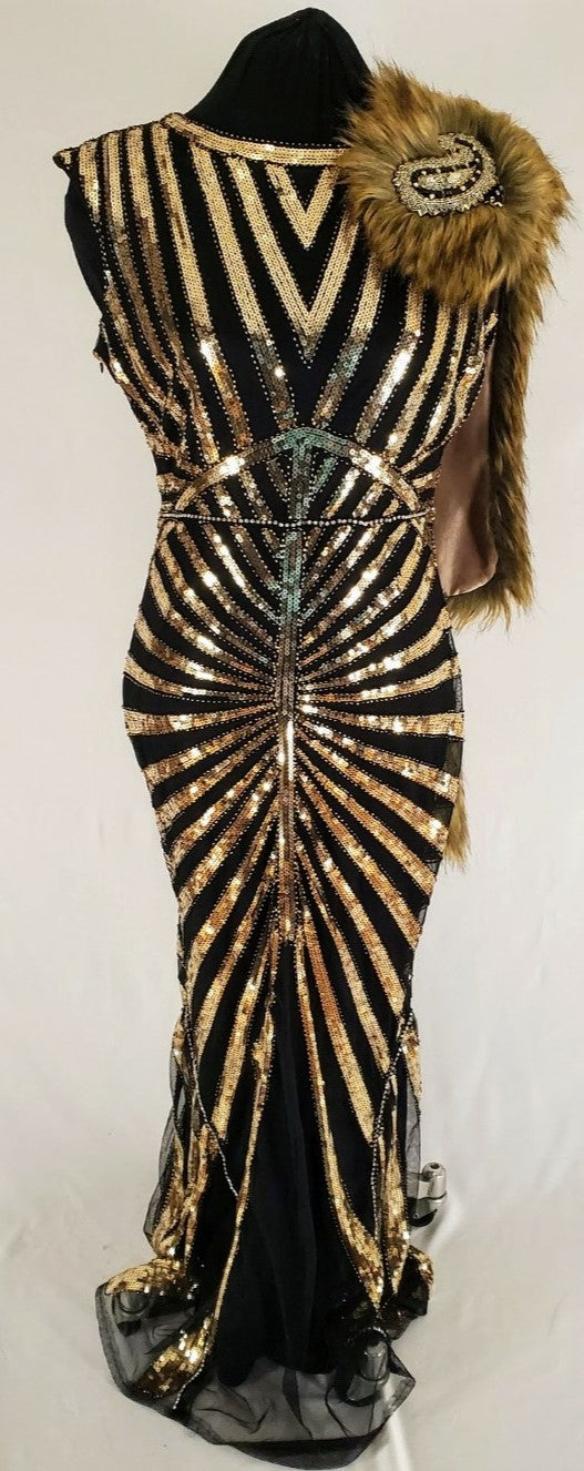 front view of Art Deco-inspired beaded gown with detachable faux fur stole and appliques on mannequin