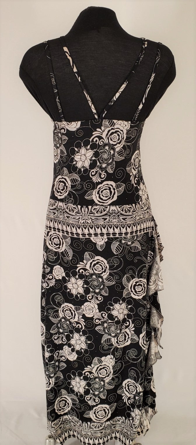 back view of Black and White Abstract Floral Summer Dress on mannequin