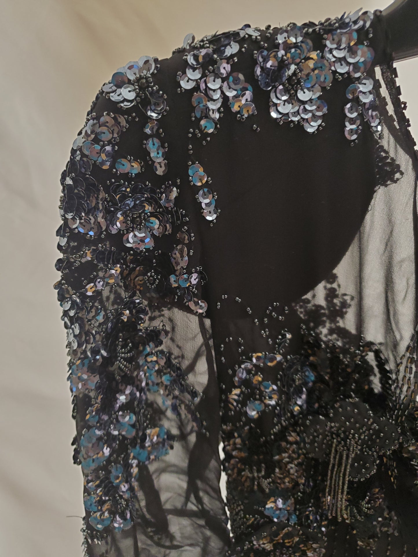 close up view of beaded shoulder on Vintage Black and Gunmetal Beaded Dress