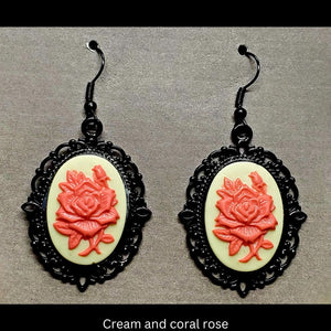Goth-inspired cream and coral acrylic 3D rose and black filigree earrings