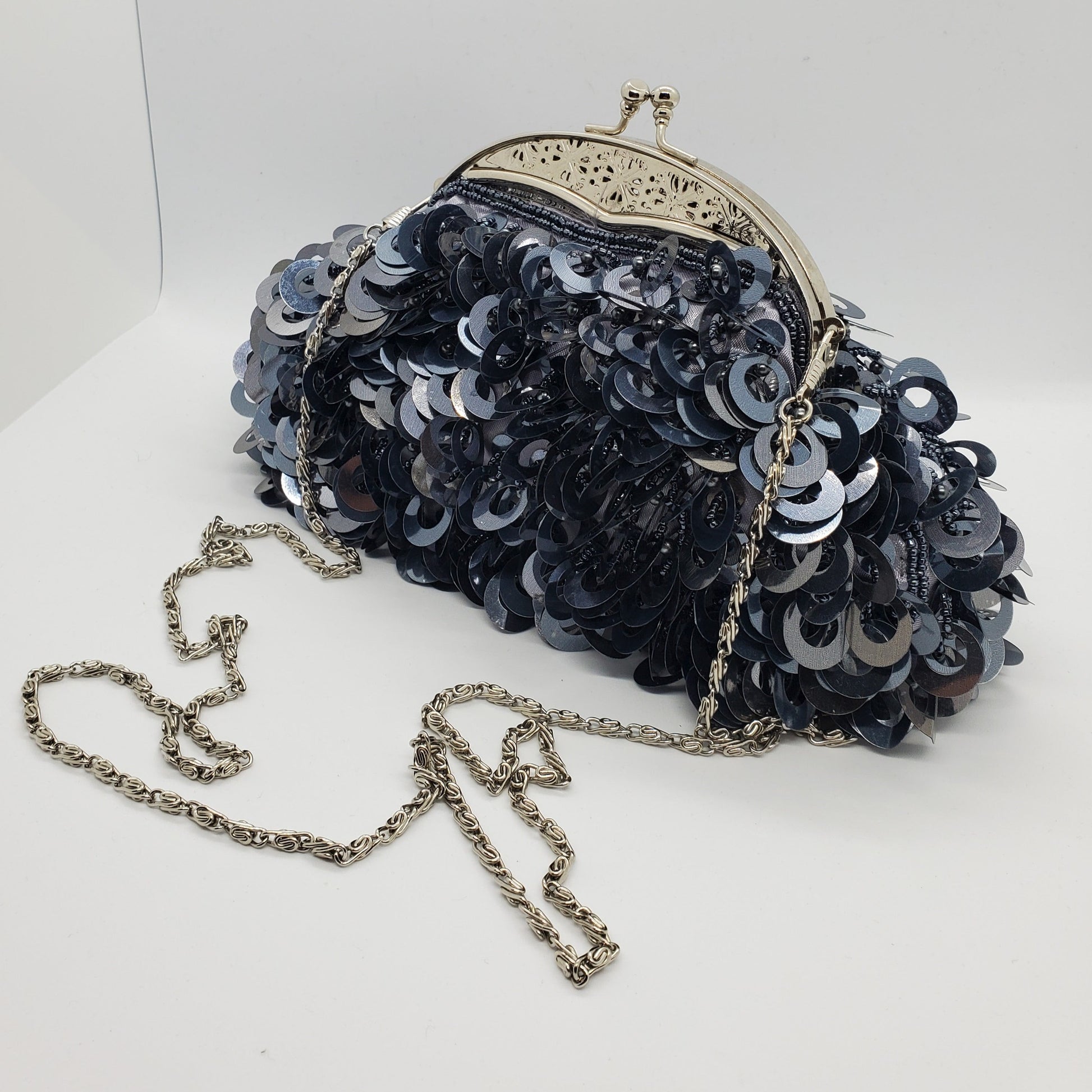 side view of  Large loop paillettes and bead purse 