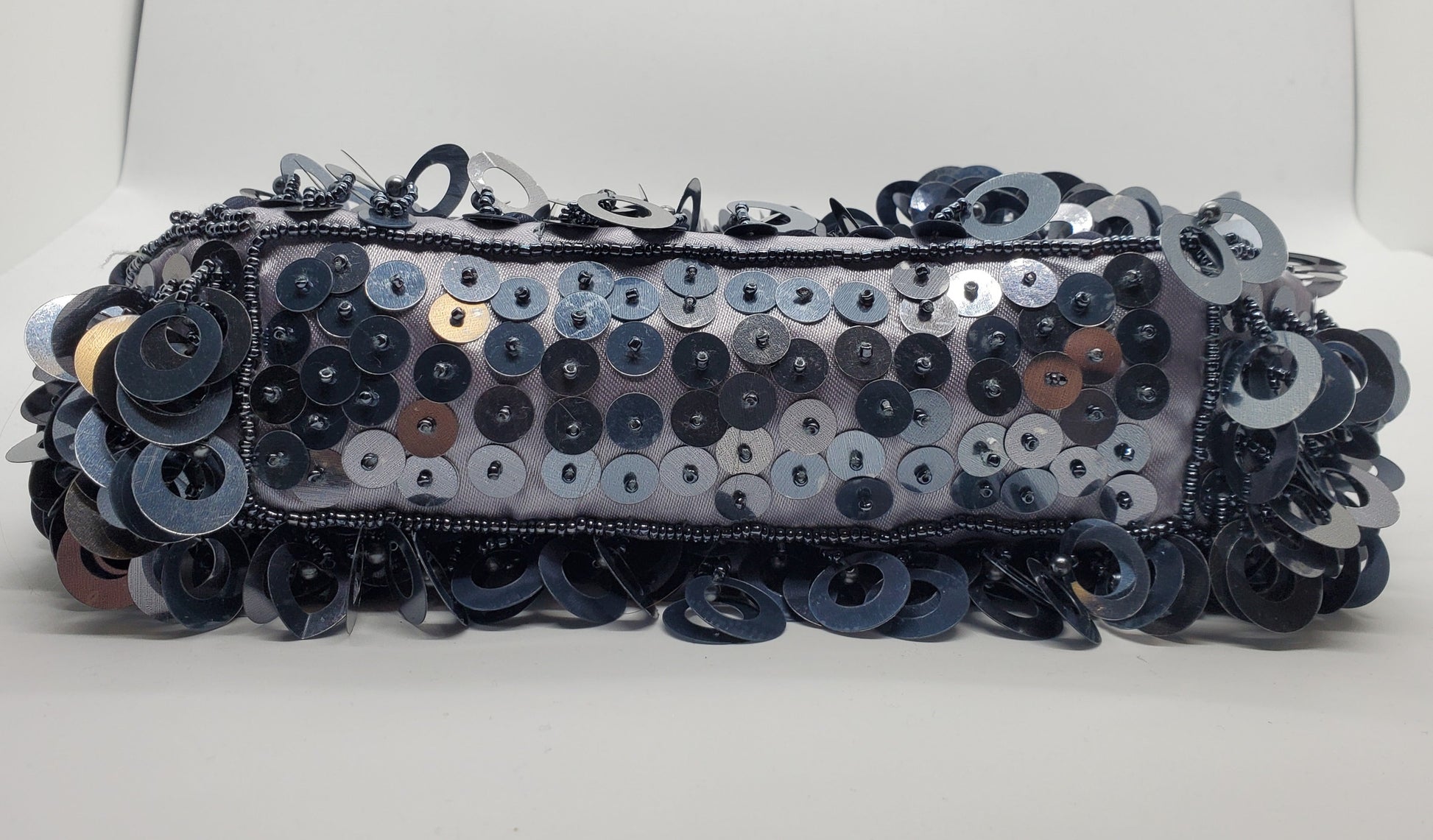 Bottom view of  Large loop paillettes and bead purse 