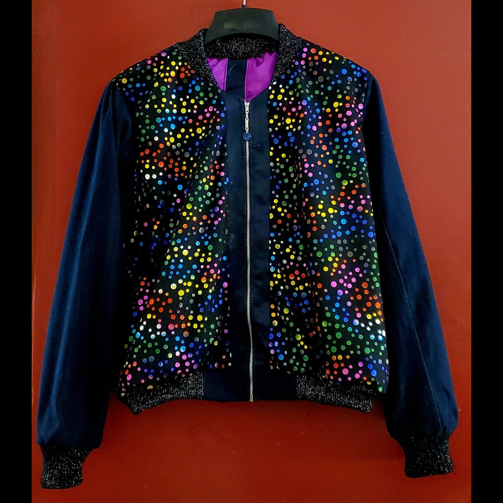 Front view of Multi-coloured polka dot and denim bomber jacket