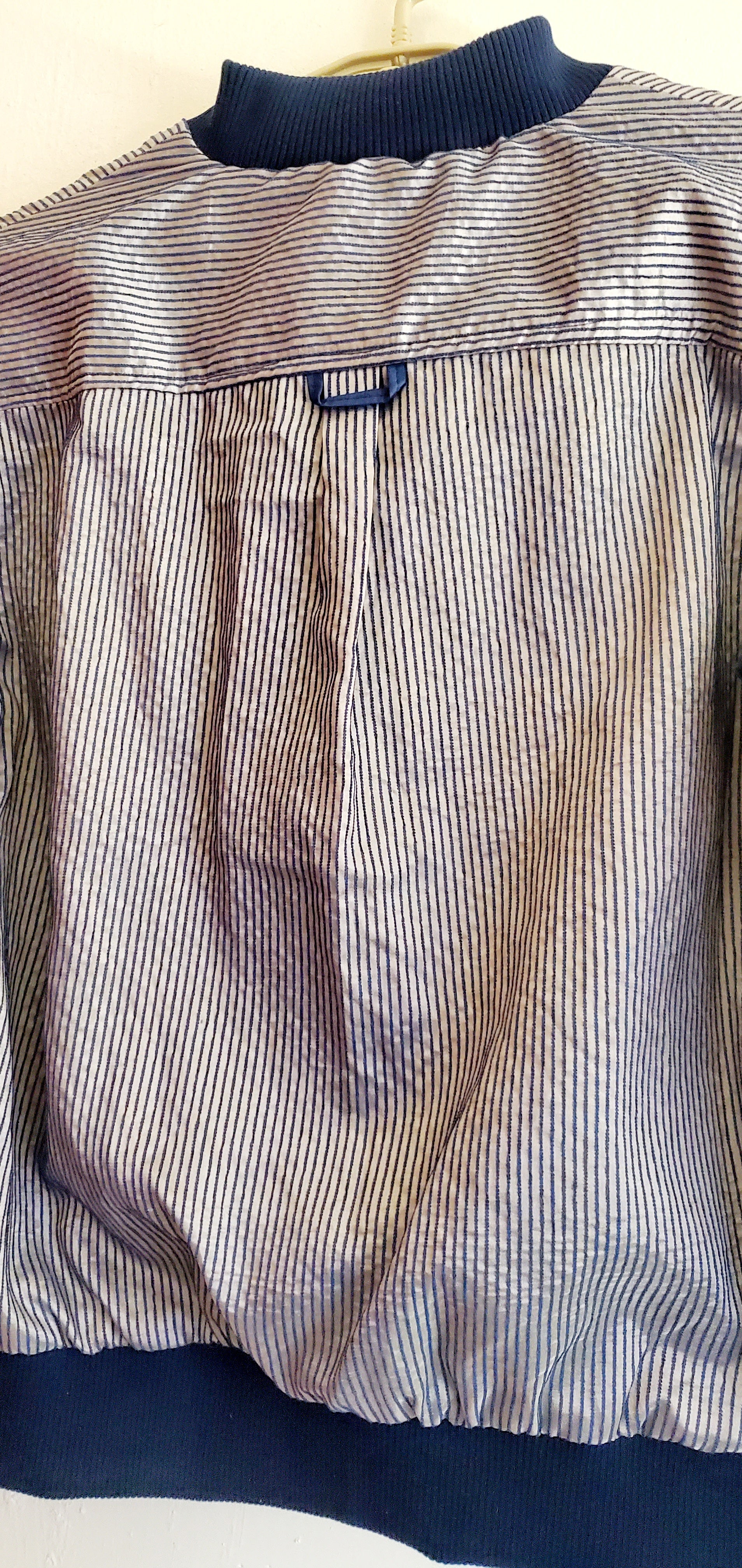 close up back view of Menswear Inspired pinstripe Bomber Jacket 