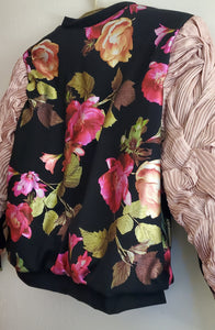 Close up back view of floral Bomber Jacket with Freeform Pleated Sleeves
