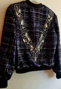 Close up back of view of Purple and Silver plaid bomber jacket with extravagant beaded sequin applique detail