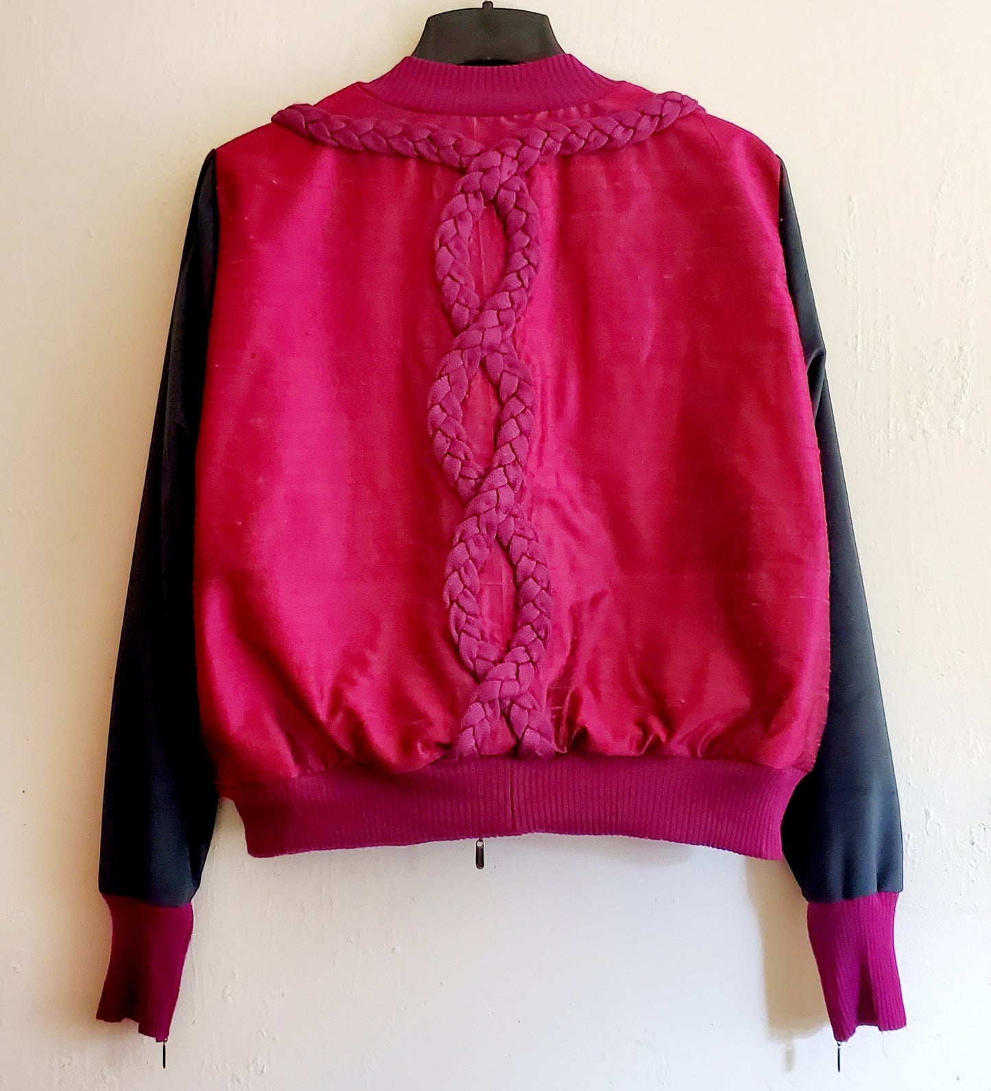 back view of Cable knit and raw silk jacket with velveteen sleeves