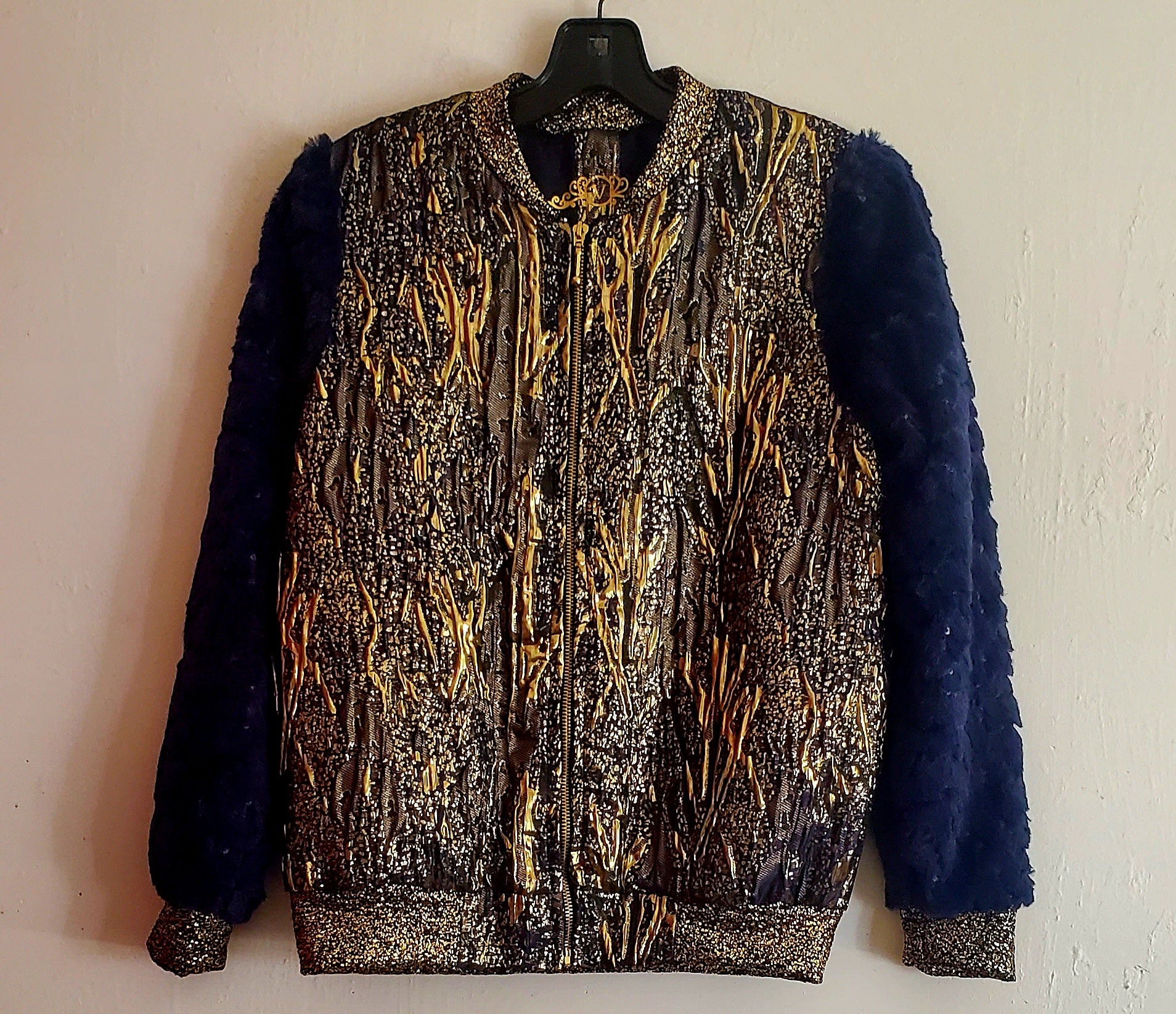 Front view of jacquard fabric and sequined faux fur