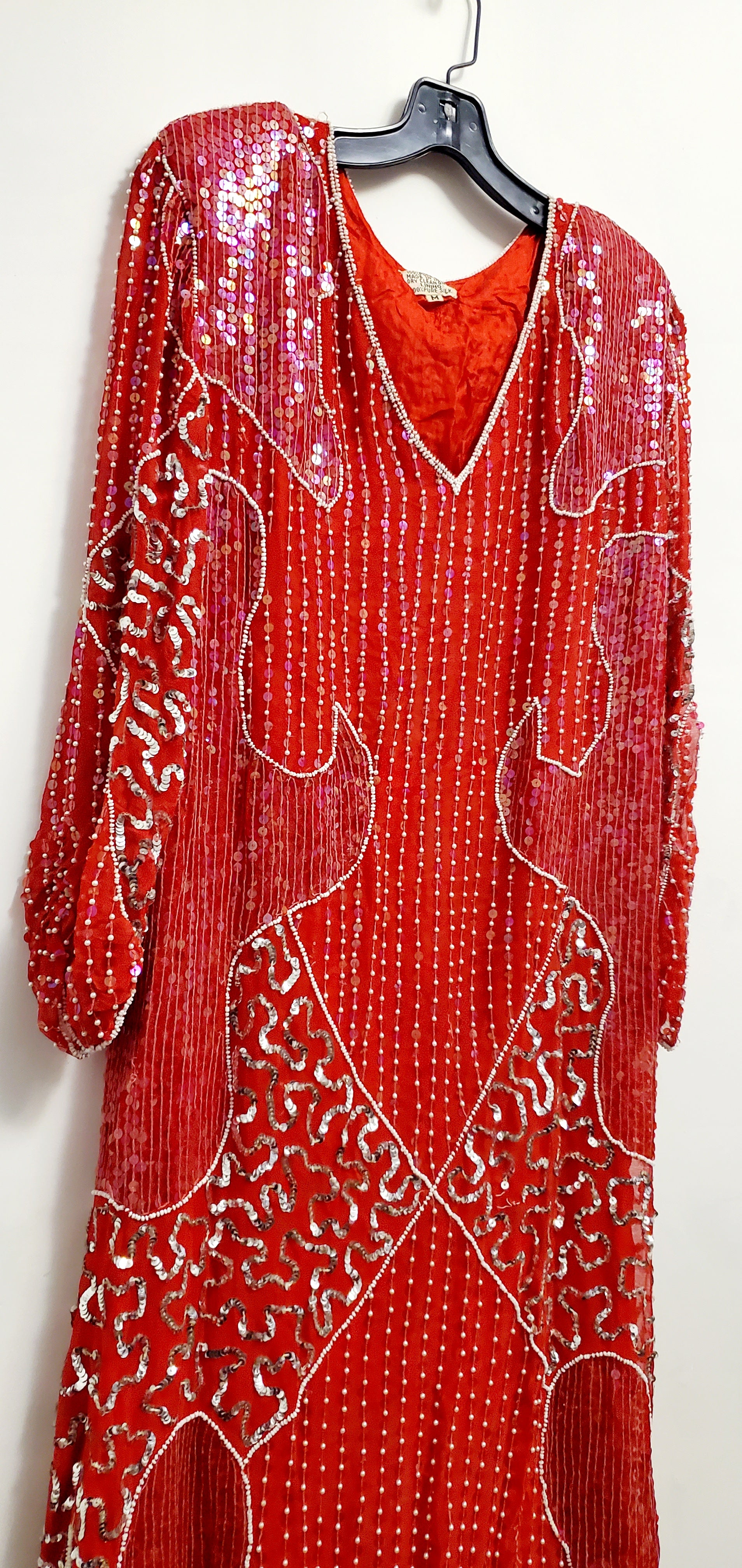 Front side view of vintage red and silver sequin dress