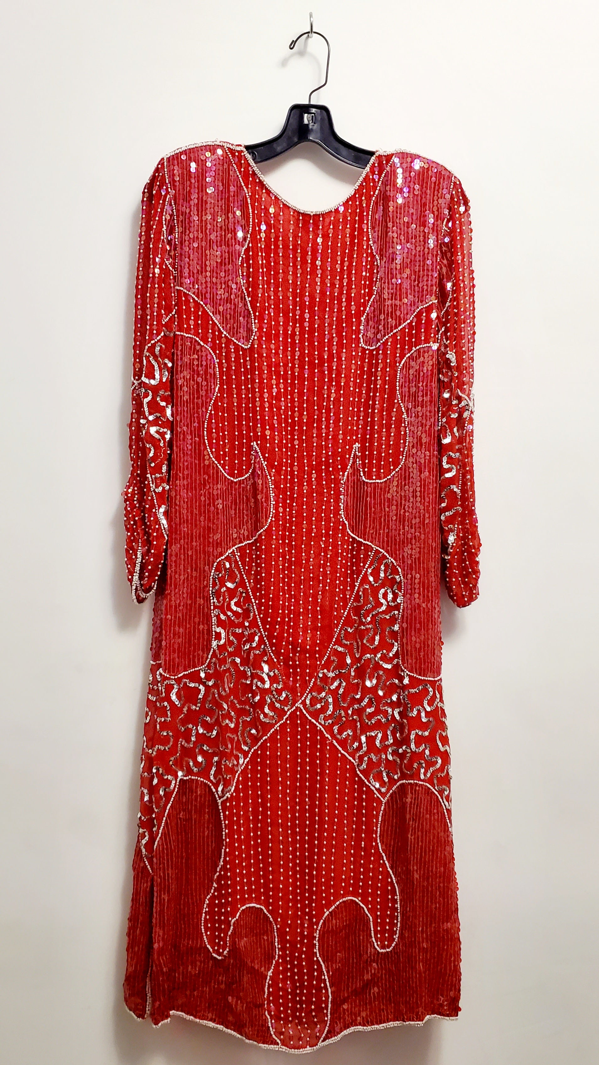 Back view of vintage red and silver sequin dress