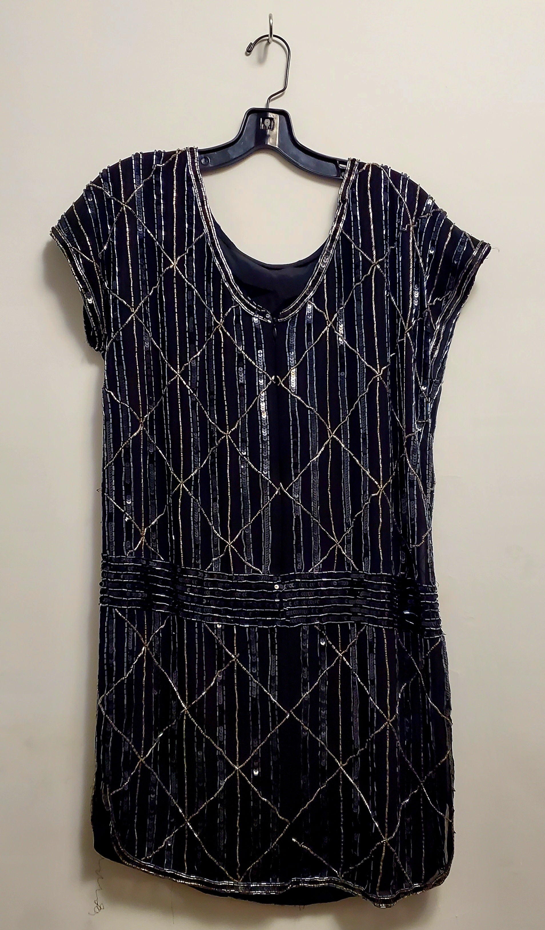 Back view of Retro black sequined shift dress