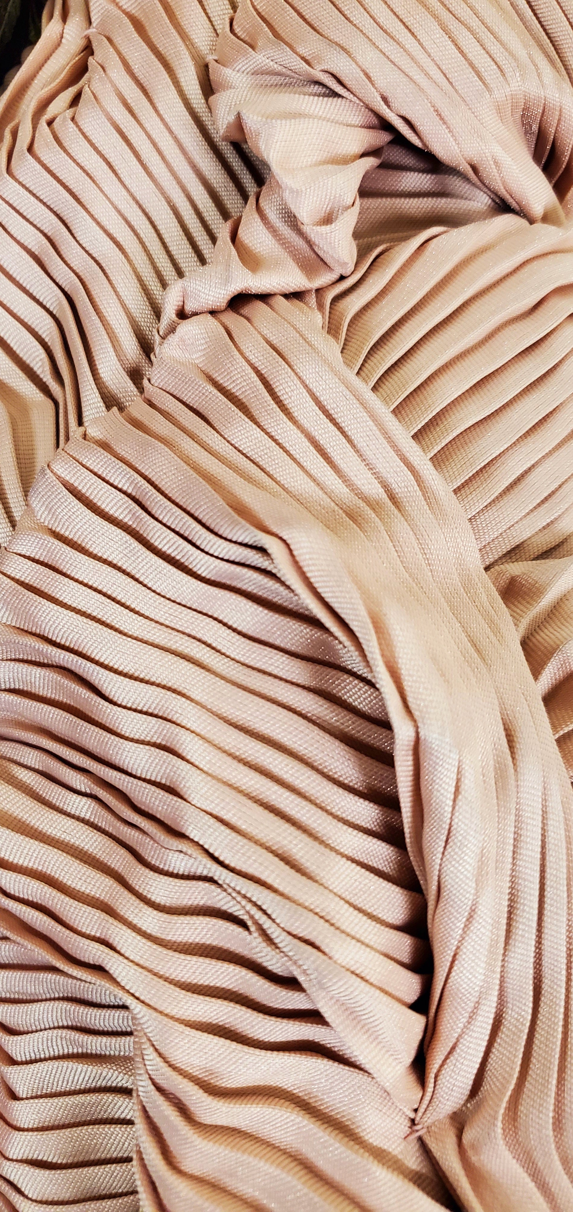 Close up view of pleated details on Sleeves
