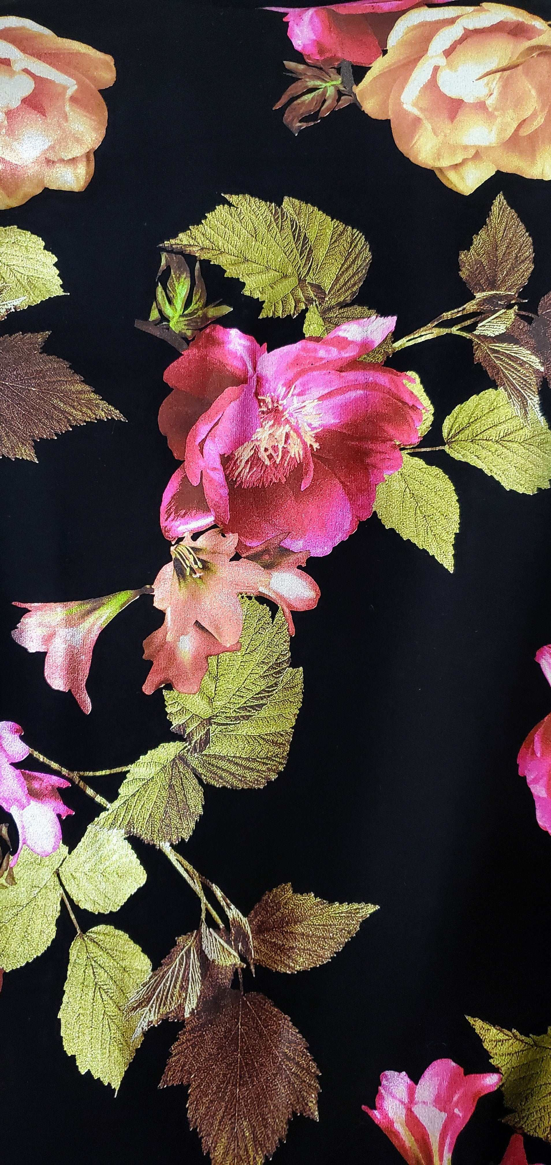 Close up view of bodice fabric of floral Bomber Jacket with Freeform Pleated Sleeves