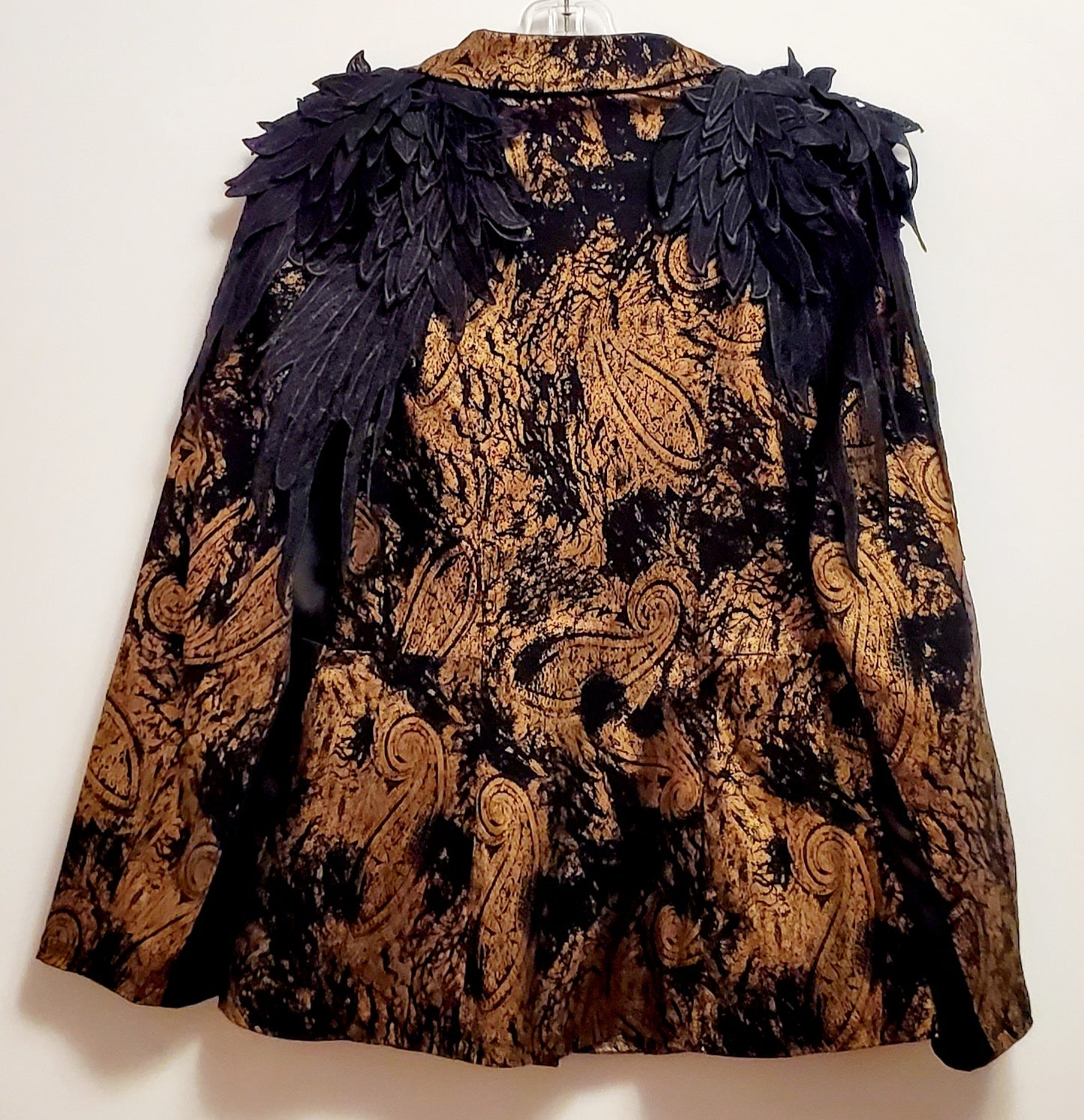 Back view of Moto jacket of 2 piece black and gold paisley suit with lace wing epaulettes