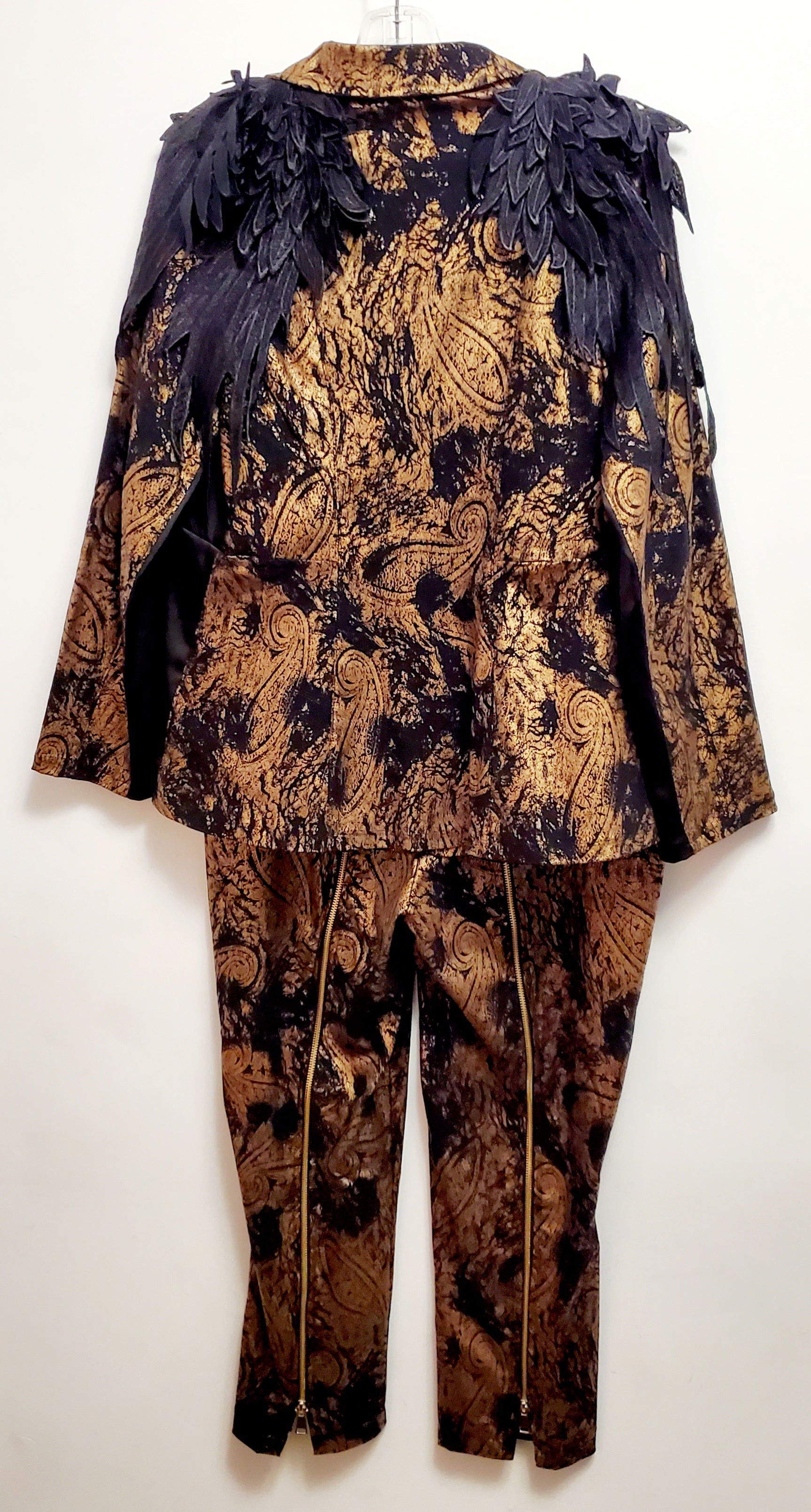 Back view of 2 piece black and gold paisley suit with lace wing epaulettes