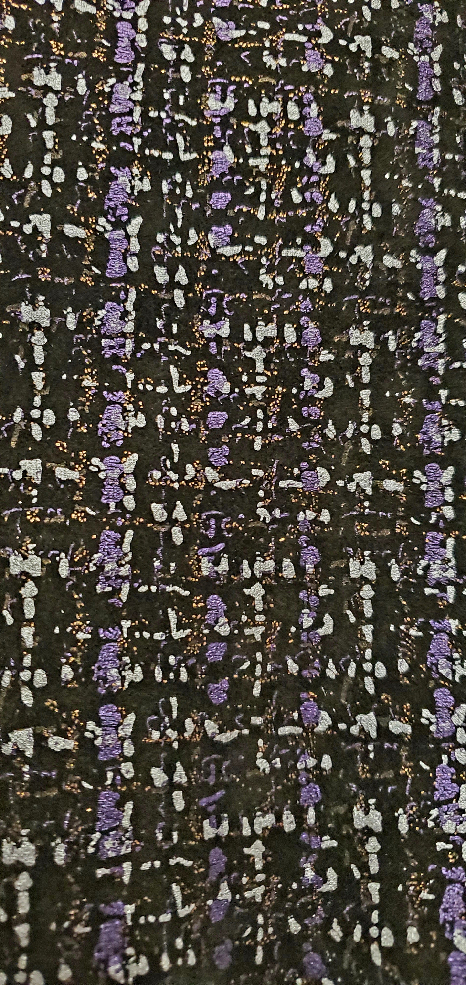 close up view of fabric print of Purple, silver, and copper tweed printed bomber jacket