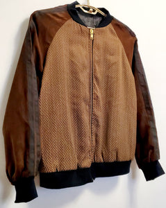 Close up view of front view of Brown Ultra Suede and Herringbone Bomber Jacket