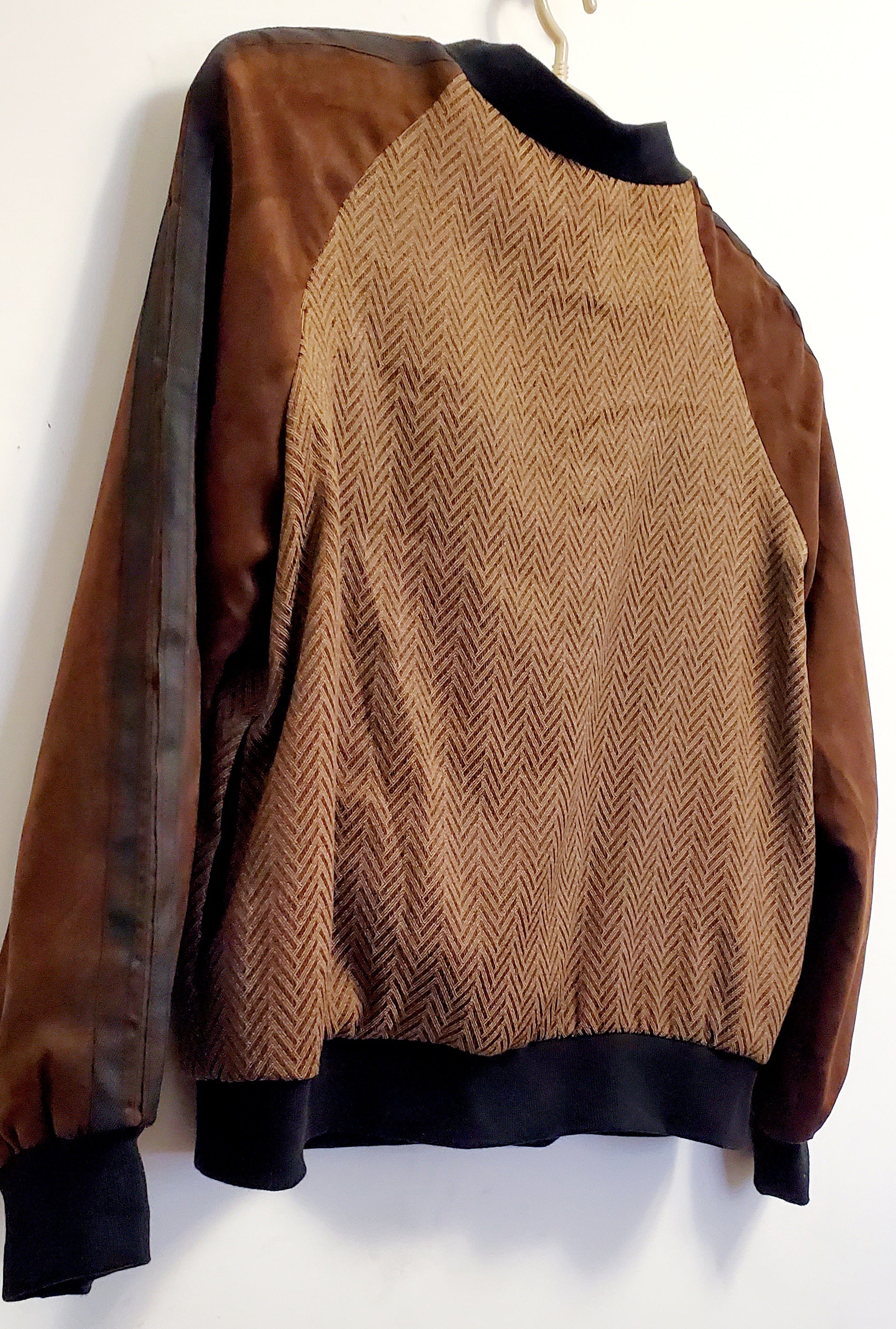 Close up back view of Brown Ultra Suede and Herringbone Bomber Jacket