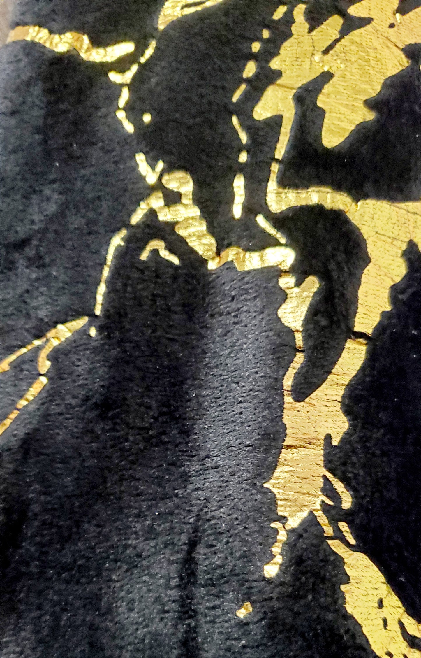 Close up view of gold marbled faux fur