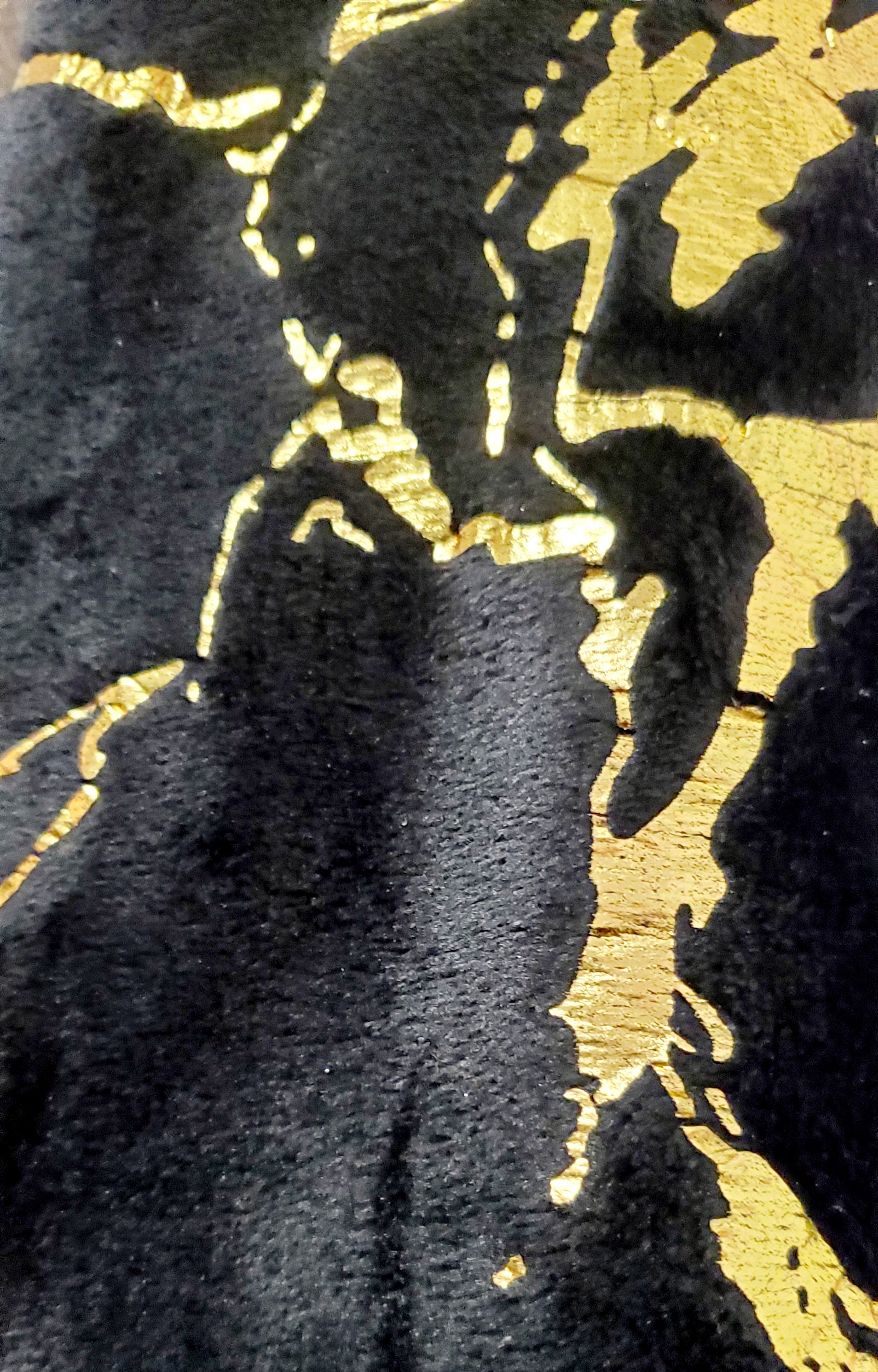 Close up view of gold marbled faux fur