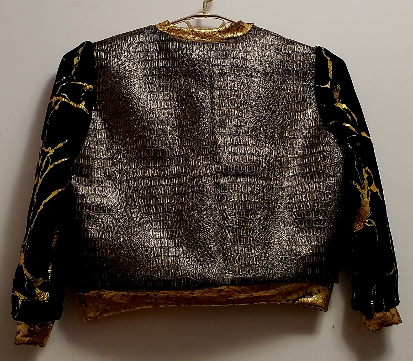 Back view of Faux alligator and marbled fur bomber jacket