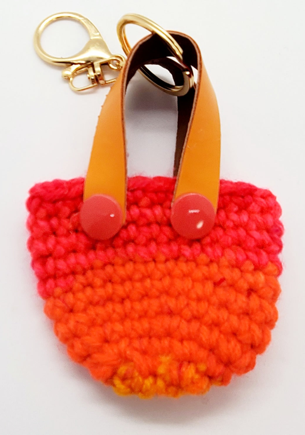 pink and orange Crochet mini tote keychain with vinyl handles