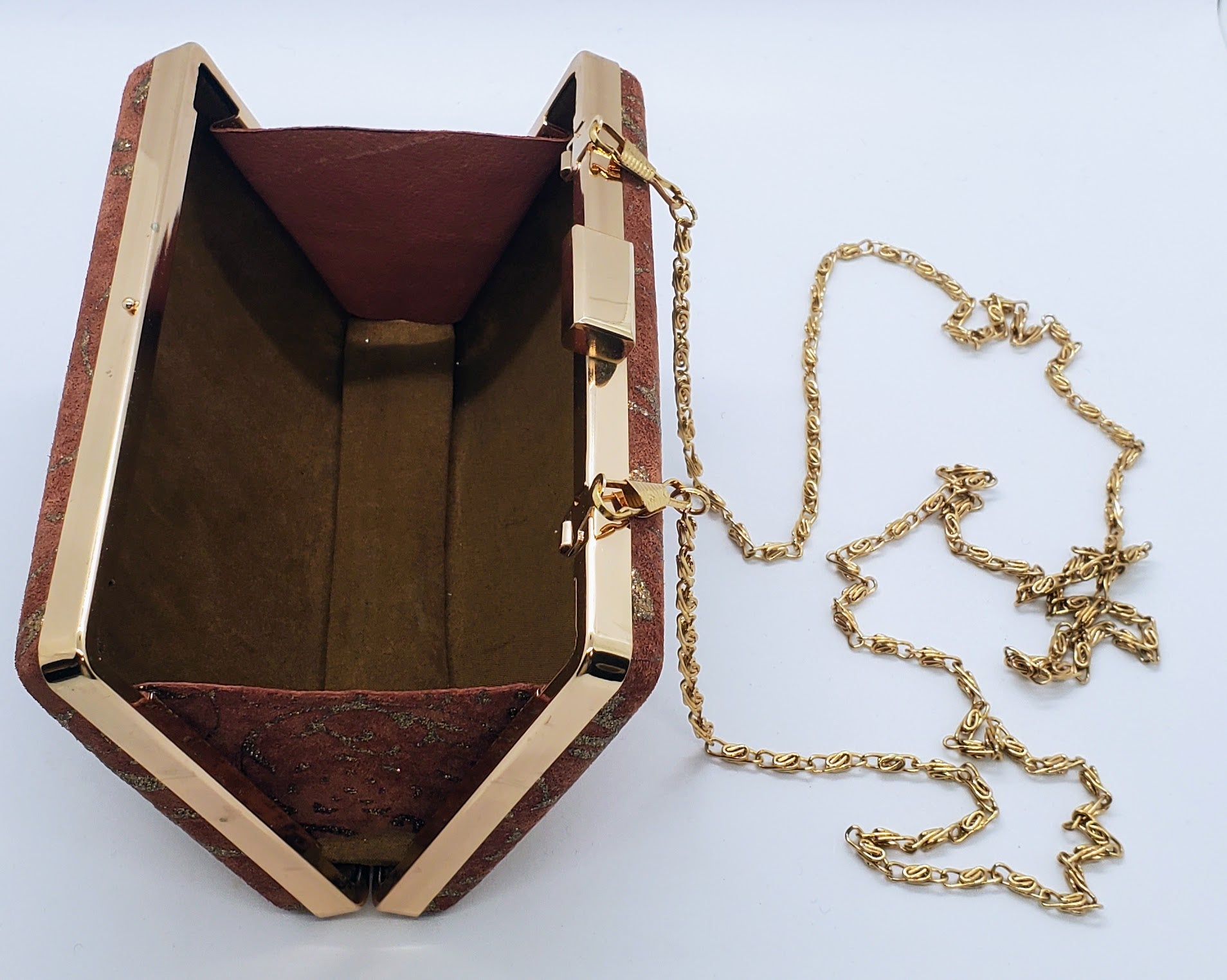 inside view of Suede and copper maudier clutch