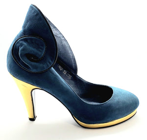 Side view of single shoe. Suann Villa blue and gold leather pumps with ruffle details