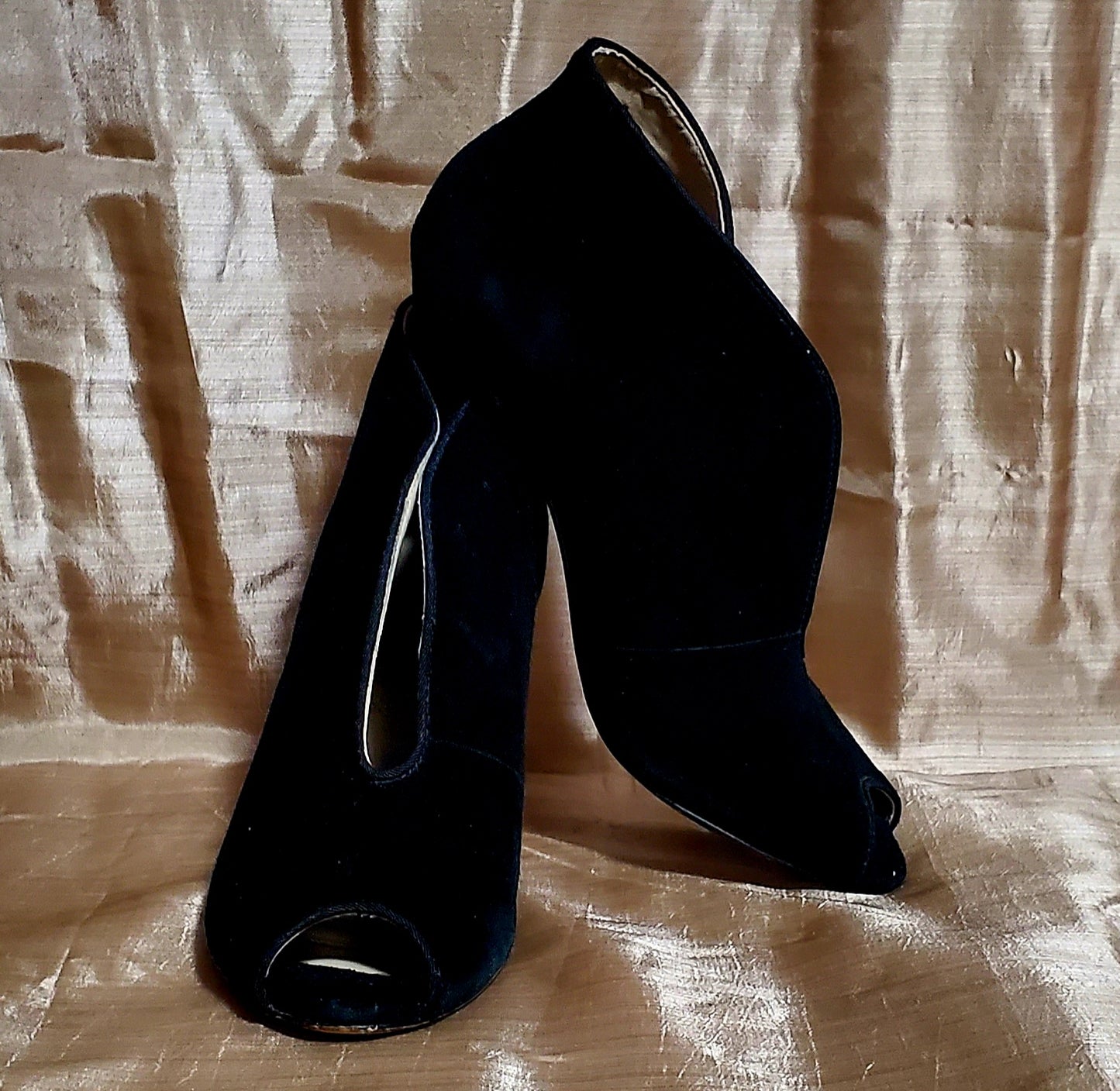 Front and side view of Adrienne Vittadini black Open toe, high top high heel shoes