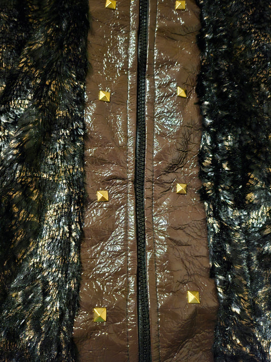 close up view of stud details of Faux fur and patent leather bomber jacket with stud details