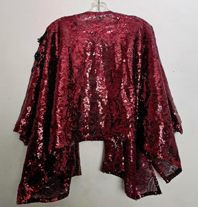 back view of Burgundy sequin kimono jacket with black embroidered shoulders on hanger
