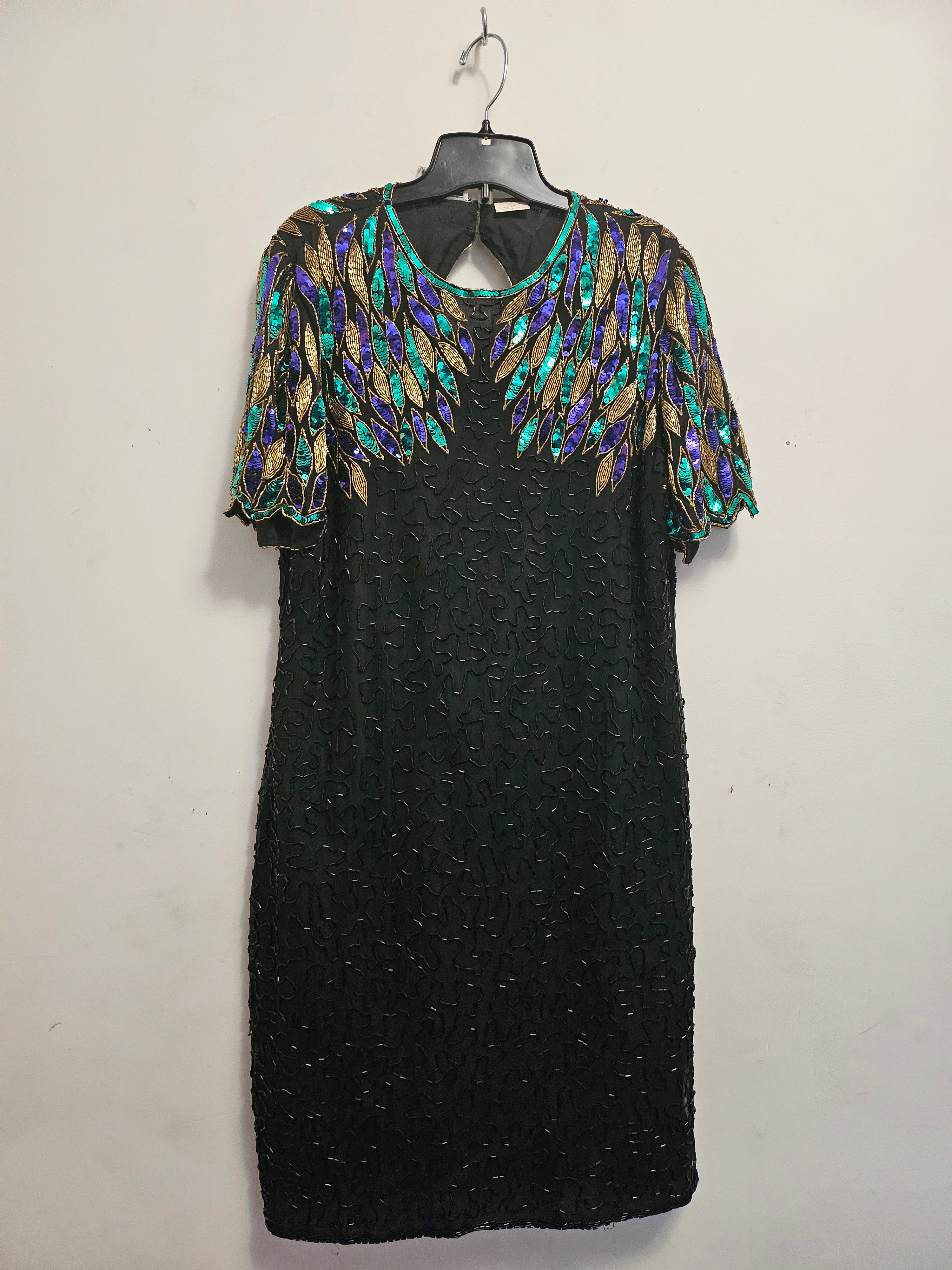 front view of 80s Peacock Beaded Cocktail Dress on hanger