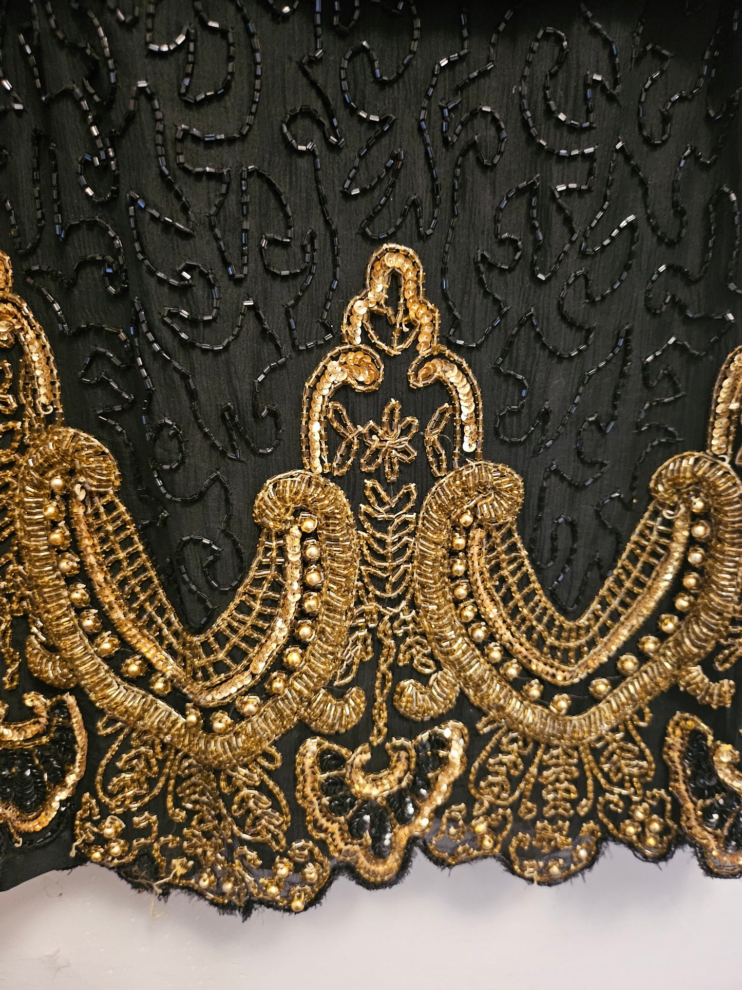 Close up view of gold details 80s Black and Gold Beaded Cocktail Dress