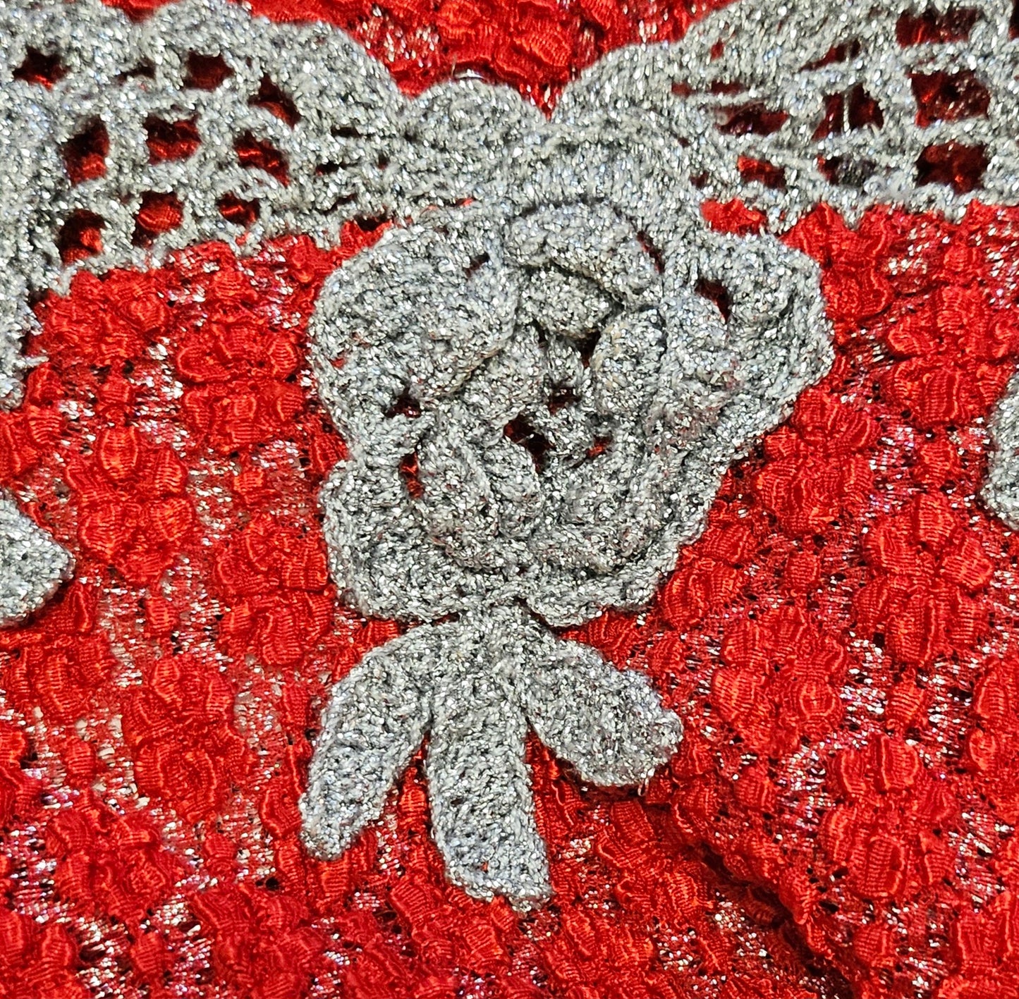 close up view of crochet on Red and Silver Crochet Dress
