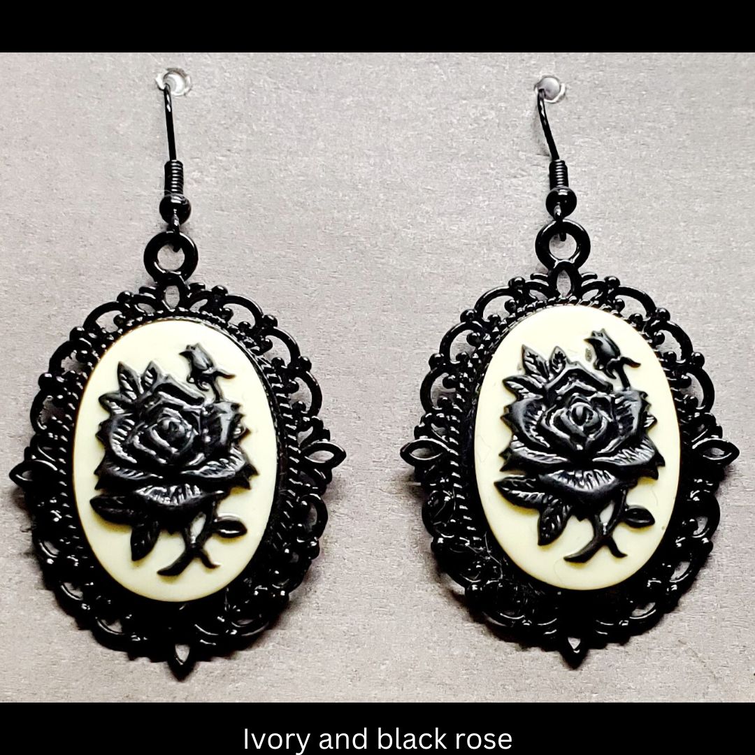 Goth-inspired ivory and black acrylic 3D rose and black filigree earrings