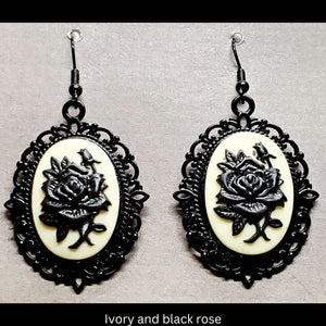 Goth-inspired ivory and black acrylic 3D rose and black filigree earrings