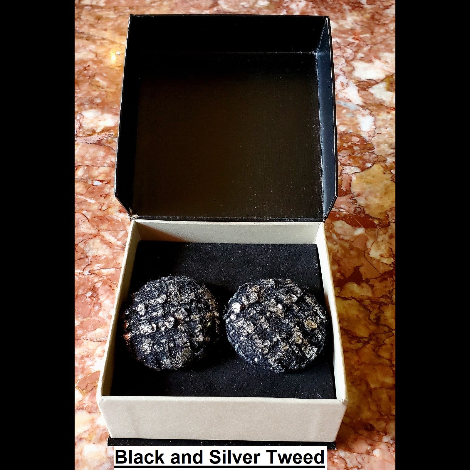 Black and silver tweed print button earrings in jewelry box