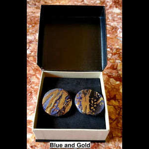 blue and gold jacquard print button earrings in jewelry box 