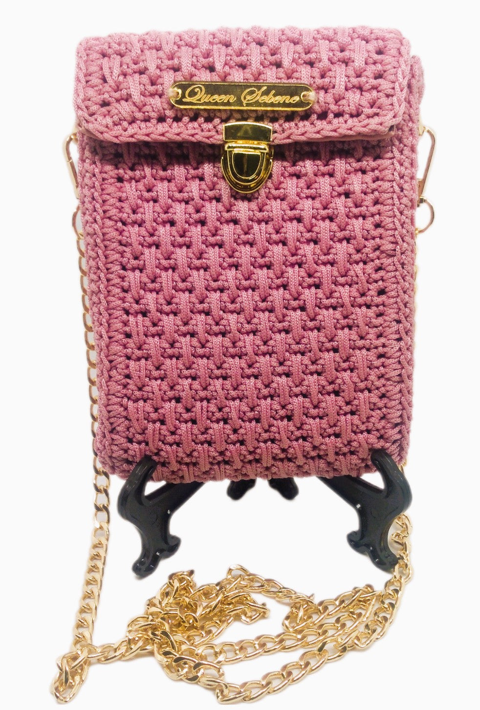 Front view of pink crochet crossbody bag